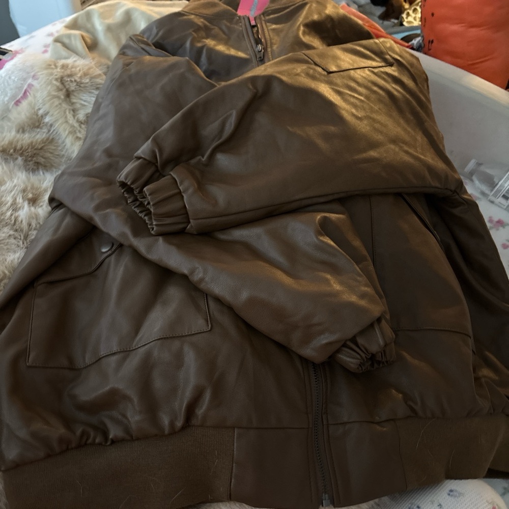 Brown leather jacket with pockets